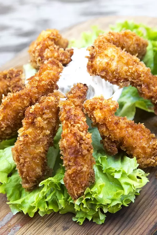 Air fryer paleo chicken breasts recipe. These chicken breasts are a tasty, healthy meal that you can make in minutes. Air frying makes crispy, juicy chicken with less oil than frying or baking. #airfryer #paleo #diet #chicken #homemade #rcipes #easy #crispy