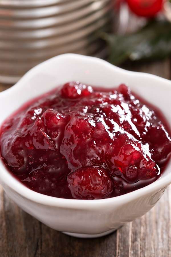 Slow cooker paleo cranberry sauce recipe. This paleo cranberry sauce recipe is sweet, tangy, and thick, just like the real thing. All you need is a slow cooker and some ingredients to make it even better.#slowcooker #crockpot #paleo #diet #sauce #homemade #easy #healthy