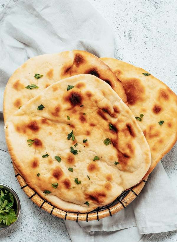 Instant pot keto naan bread. Get ready to enjoy the delicious taste of naan bread without all the carbs. With our Instant Pot Keto Naan Bread recipe, you can make a batch in no time and enjoy a tasty, low-carb version of this classic Indian dish. #instantpot #pressurecooker #indian #healthy #lowcarb #keto #bread #recipes