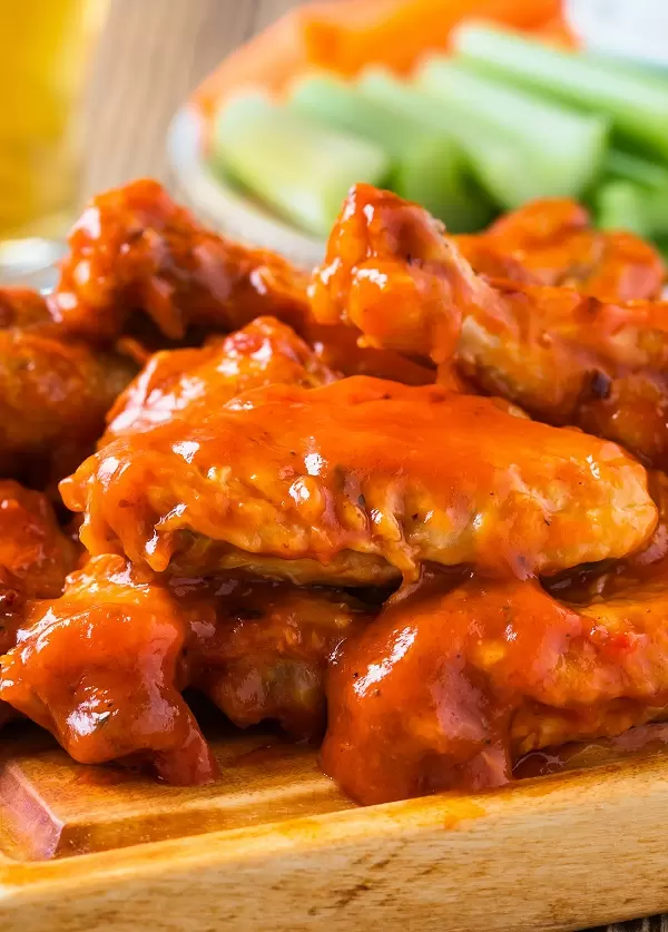 slow-cooker-keto-buffalo-chicken-wings Slow cooker keto Buffalo chicken wings. Get ready for the perfect game-day snack with this slow cooker keto Buffalo chicken wings recipe. #slowcooker #crockpot #keto #chicken #wings #recipes #party #healthy #homemade