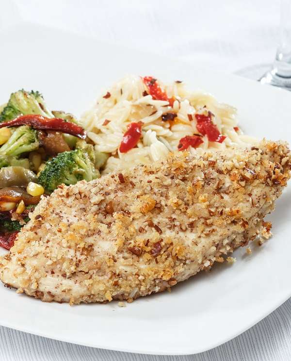 Air fryer keto pecan-crusted chicken. Enjoy this crunchy and delicious air fryer keto pecan-crusted chicken recipe! #airfryer #keto #lowcarb #glutenfree #dinner #chicken #homemade