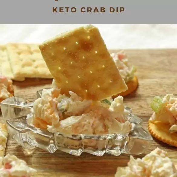 slow-cooker-keto-crab-dip Slow cooker keto crab dip. Keto crab dip is easy to make and low in carbs/calories. It's a dish perfect for gatherings and parties, or as a quick appetizer for a fun social get-together. #slowcooker #crockpot #keto #lowcarb #glutenfree #diet #healthy #creamy #dip #crabs #seafood #appetizers